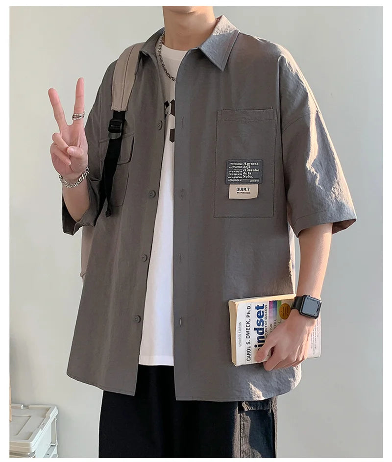 Chemises à manches courtes pour hommes pour l'été Chemises japonaises décontractées à col chemisier Chemises oversize à multiples poches de grande marque Chemises tendance pour hommes