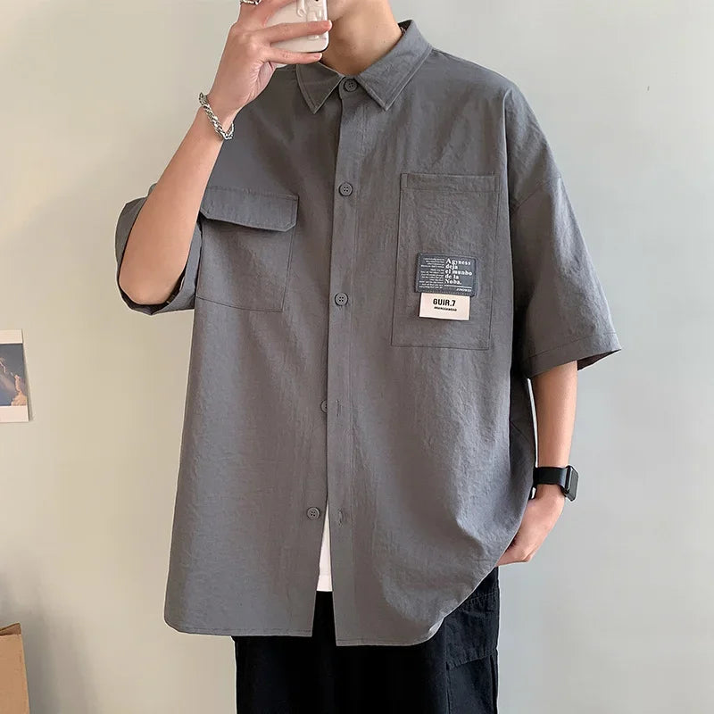 Chemises à manches courtes pour hommes pour l'été Chemises japonaises décontractées à col chemisier Chemises oversize à multiples poches de grande marque Chemises tendance pour hommes