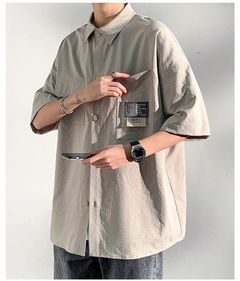 Chemises à manches courtes pour hommes pour l'été Chemises japonaises décontractées à col chemisier Chemises oversize à multiples poches de grande marque Chemises tendance pour hommes