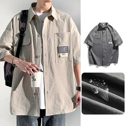 Chemises à manches courtes pour hommes pour l'été Chemises japonaises décontractées à col chemisier Chemises oversize à multiples poches de grande marque Chemises tendance pour hommes