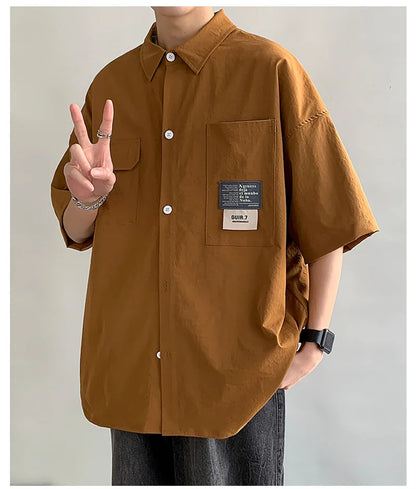 Chemises à manches courtes pour hommes pour l'été Chemises japonaises décontractées à col chemisier Chemises oversize à multiples poches de grande marque Chemises tendance pour hommes