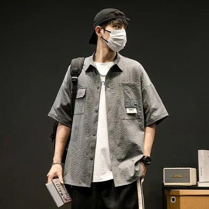 Chemises à manches courtes pour hommes pour l'été Chemises japonaises décontractées à col chemisier Chemises oversize à multiples poches de grande marque Chemises tendance pour hommes