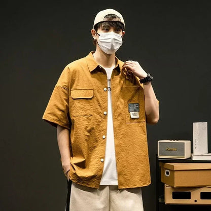 Chemises à manches courtes pour hommes pour l'été Chemises japonaises décontractées à col chemisier Chemises oversize à multiples poches de grande marque Chemises tendance pour hommes