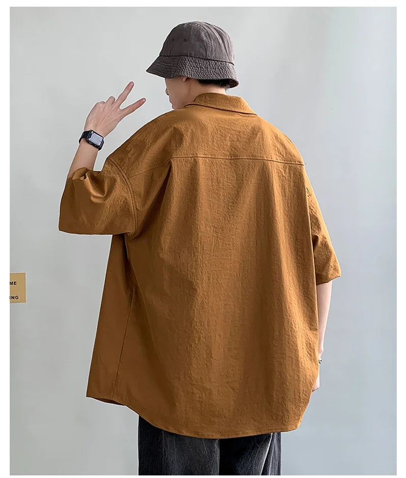 Chemises à manches courtes pour hommes pour l'été Chemises japonaises décontractées à col chemisier Chemises oversize à multiples poches de grande marque Chemises tendance pour hommes