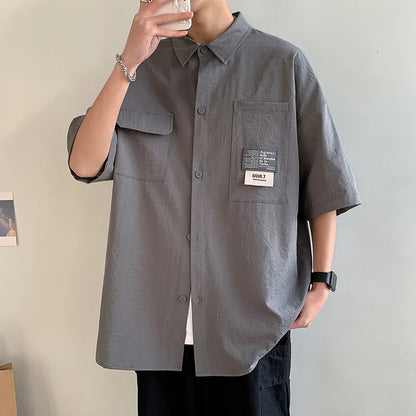 Chemises à manches courtes pour hommes pour l'été Chemises japonaises décontractées à col chemisier Chemises oversize à multiples poches de grande marque Chemises tendance pour hommes