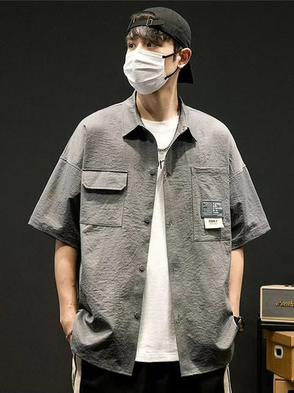 Chemises à manches courtes pour hommes pour l'été Chemises japonaises décontractées à col chemisier Chemises oversize à multiples poches de grande marque Chemises tendance pour hommes