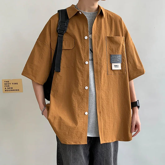 Chemises à manches courtes pour hommes pour l'été Chemises japonaises décontractées à col chemisier Chemises oversize à multiples poches de grande marque Chemises tendance pour hommes