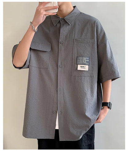 Chemises à manches courtes pour hommes pour l'été Chemises japonaises décontractées à col chemisier Chemises oversize à multiples poches de grande marque Chemises tendance pour hommes