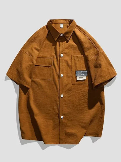 Chemises à manches courtes pour hommes pour l'été Chemises japonaises décontractées à col chemisier Chemises oversize à multiples poches de grande marque Chemises tendance pour hommes