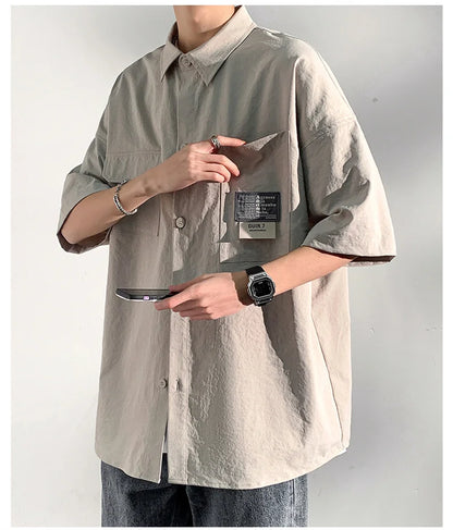 Chemises à manches courtes pour hommes pour l'été Chemises japonaises décontractées à col chemisier Chemises oversize à multiples poches de grande marque Chemises tendance pour hommes